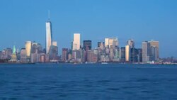 Statue of Liberty, One World Trade Center and Downtown Manhattan across the Hudson River, New York, Manhattan, United States of America - Time lapse Stock Footage