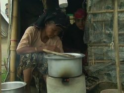 Female refugee cooking in Sittwe Rohingya camp News Clip