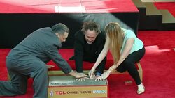 Tim Burton at the Tim Burton To Place Handprints-Footprints In Cement At TCL Chinese Theatre IMAXï¿½ Forecourt Stock Footage
