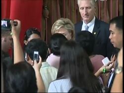 Secretary of state meets counterpart; tours flood school News Clip