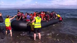 Migrant Boat Arrives On Lesbos Beach News Clip