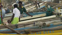 Fishermen and boats in Katugoda, Sri Lanka News Clip