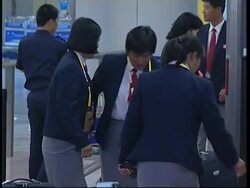 North Korean team arriving for Olympic games News Clip