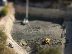 Excavator working on road Stock Footage