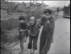 B/W 1960s three female Vietnamese refugees outdoors begging / Vietnam War / newsreel Stock Footage