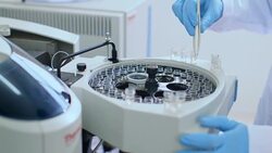 people doing chemical experiment in lab 4k Stock Footage