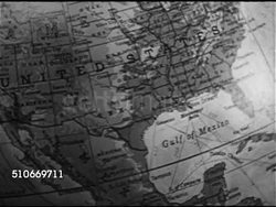 1953: OUR STAKE IN TROUBLED MOROCCO: CU United States map on globe, globe turning to Africa w/ highlighted 'Morocco' superimposed on map. Instructional Video