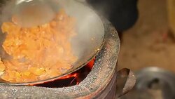 panning:  Fired Pickle turnip in a old pan Stock Footage