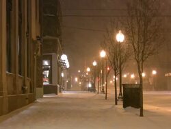 Christmas time winter weather. Snowstorm, snowflakes, snow, snowing. Urban scene. Stock Footage