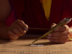 MS Sand being poured from  funnel onto  outline sketche on wood  / Kathmandu, Central, Nepal Stock Footage