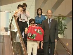 Hundreds line up to get the new dollar note which marks the Olympics News Clip