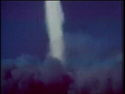 1960s missile blasting off in cloud of smoke (night?) / Cold War / documentary Stock Footage