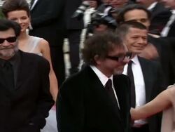 Giovanna Mezzogiorno, Tim Burton and Giovanna Mezzogiorno at the Robin Hood Red Carpet: Cannes Film Festival 2010 at Cannes . (Footage by WireImage Video/GettyImages) Stock Footage