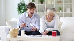 senior couple calculating domestic bills Stock Footage