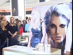 Designer launches new perfume at Harrods News Clip