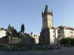 Wide Shot static-Pedestrians walk through a town square in Prague. / Prague, Czech Republic Stock Footage