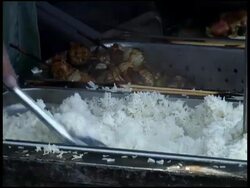 Stirring, Serving Steamed White Rice (put into Polystyrene Plastic container) Stock Footage