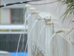 Rain pattering out of Pipe Stock Footage