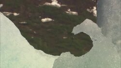 Water drips from melting ice in Alaska. Stock Footage