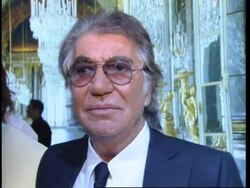 Veteran designer shows of his latest collection. comments on anorexia News Clip