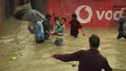 India / Pakistan - Floods - Worst floods in 22 years kill at least 14 / Families forced to abandon their homes as monsoon rains kill more than 200 in Pakistan and India /Bridegroom and 17 others killed in sinking of boat carrying wedding party News Clip