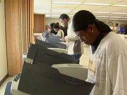 MS, People casting their votes at electronic voting machines, Toledo, Ohio, USA Stock Footage