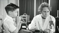 1948 MONTAGE Scientists consult with the new family at the Pioneer Health Centre in Peckham / London, England Stock Footage