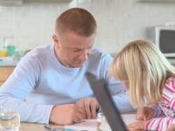 DOLLY: Working mother Stock Footage