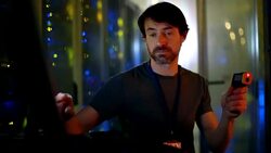 Server room technician using scanner at computer Stock Footage