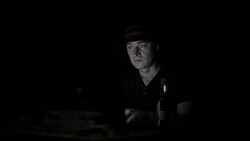 Angry man working on laptop in the dark Stock Footage