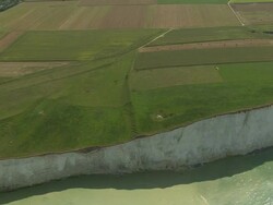 AERIAL, White cliffs and fields of Ault, Picardie, France Stock Footage