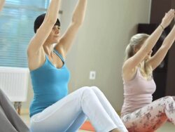 Small Group Doing Pilates Exercises Stock Footage