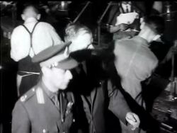 KING WITH SUNDAY MUNITIONS WORKERS - News Clip