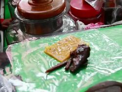 MS PAN TU TD Man preparing digestive condiments at stall / Amritsar, Punjab, India Stock Footage