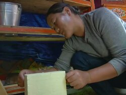 MS Nomad woman making cheese / Central-south Mongolia, Central-south Mongolia, Mongolia Stock Footage