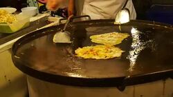 Beautiful chef cooking seafood Stock Footage