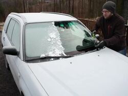 Scraping frozen windows Stock Footage