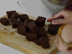cutting chocolate Stock Footage