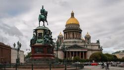 Russia, Saint Petersburg, Golden dome of St Isaac's Cathedral (1818) and the equestrian statue of Tsar Nicholas (1859) - Time lapse Stock Footage