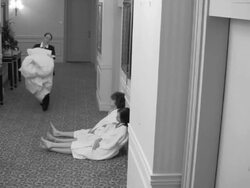 (HD1080i) Hotel Humor: Surveillance Camera on Impatient Guests Stock Footage