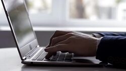 Man typing on the laptop Stock Footage
