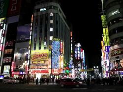 MS Traffic on street at night / Shinjyuku, Tokyo, Japan Stock Footage