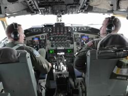 TS Air Force Pilots in cockpit during flight, Colorado Rockies, Colorado, USA Stock Footage
