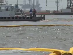 BP Oil Boom Being Laid Stock Footage