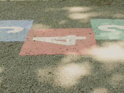 deserted school yard with hopscotch marks Stock Footage