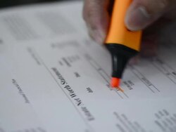 Highlighter pen mark on financial data Stock Footage