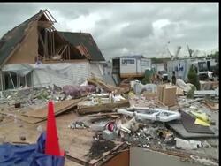 Residents just outside St. Louis spent Monday combing through debris and trying to salvage personal belongings following a devastating tornado that also hit the city's airport, causing millions of dollars worth of damage to the facility News Clip