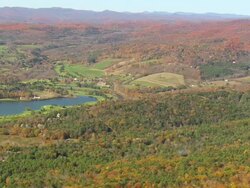 WS AERIAL ZI ZO PAN View of State Park and Lakeland golf course at Quechee village / Vermont, United States Stock Footage