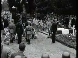 Those who have lost their lives defending Rotterdam are remembered during a memorial service at the cemetery Cooswijk. German soldiers also attend the service and lay a wreath  Stock Footage
