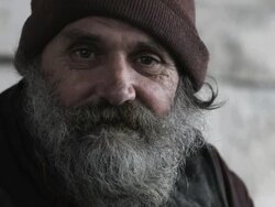 homeless man looking at the camera Stock Footage